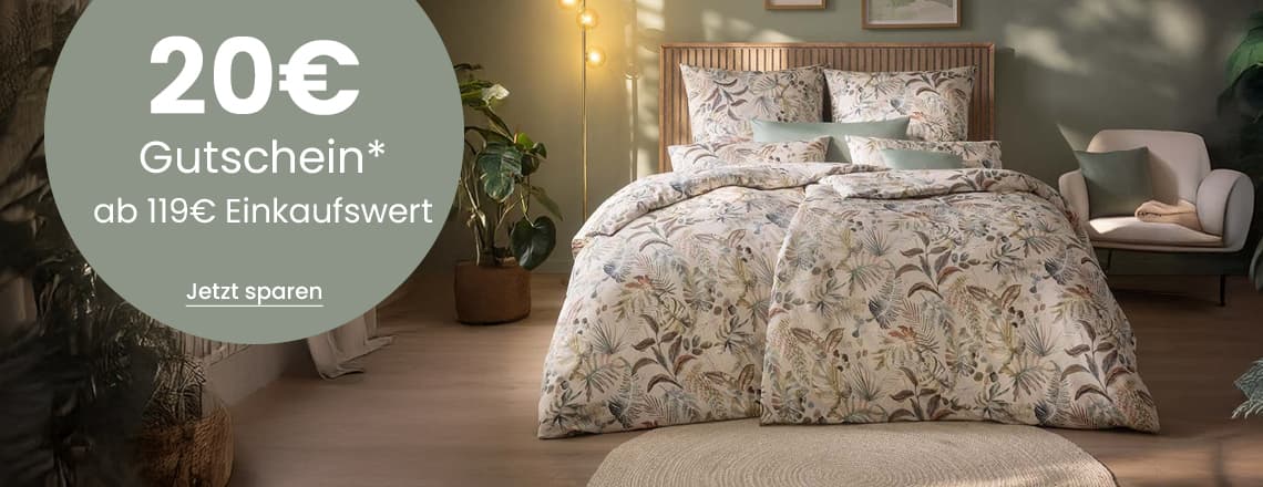 20€ Gutschein ab 119€ Einkaufswert – Doppelbett mit gemusterter Bettwäsche in gemütlichem Schlafzimmer